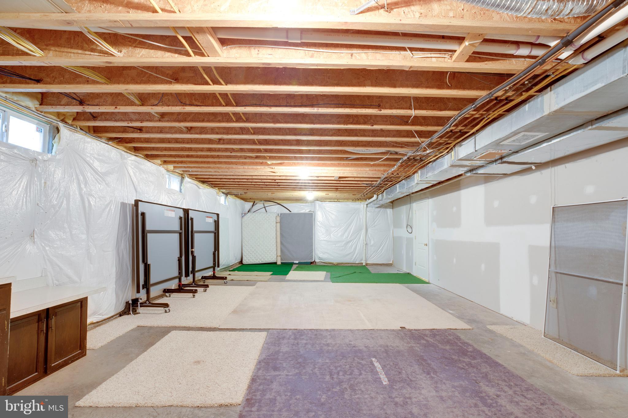 8277 Roxborough Loop Gainesville, VA 20155 - Photo 63 of 85 a view of a room with gym equipment