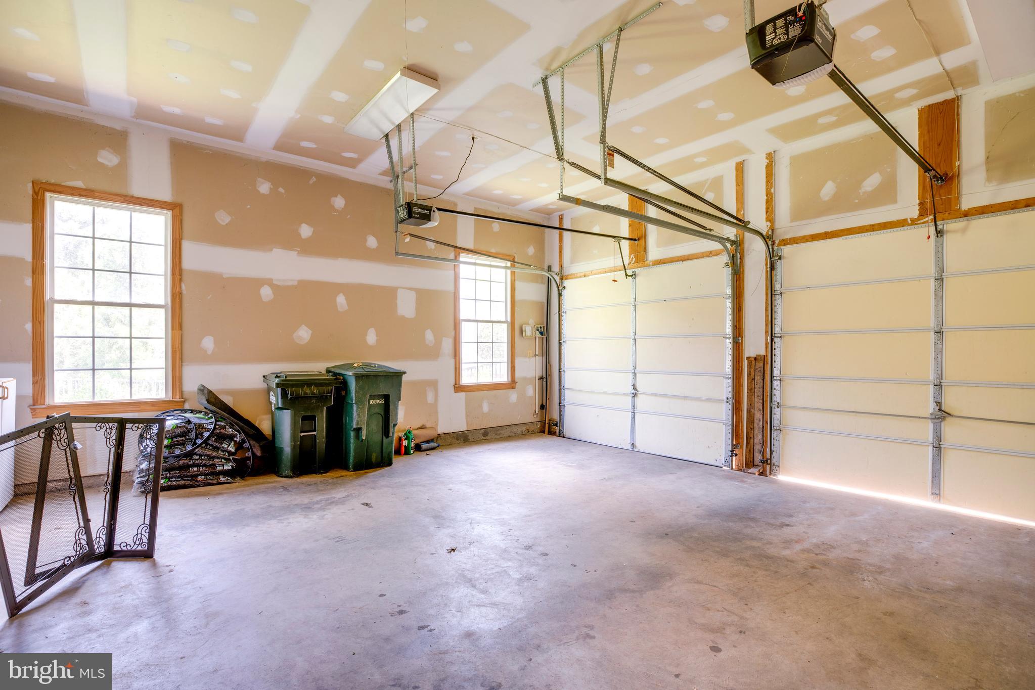 8277 Roxborough Loop Gainesville, VA 20155 - Photo 66 of 85 a view of a livingroom with furniture and a window