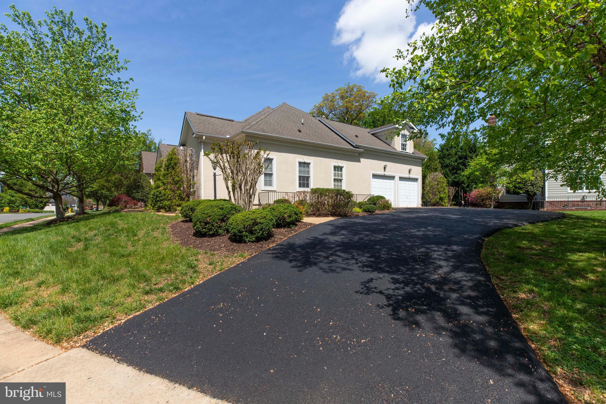 8277 Roxborough Loop Gainesville, VA 20155 - Photo 73 of 85 a front view of a house with a yard
