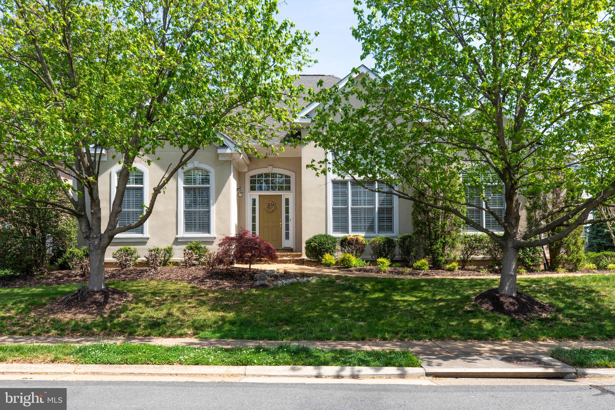 8277 Roxborough Loop Gainesville, VA 20155 - Photo 75 of 85 a front view of a house with a yard