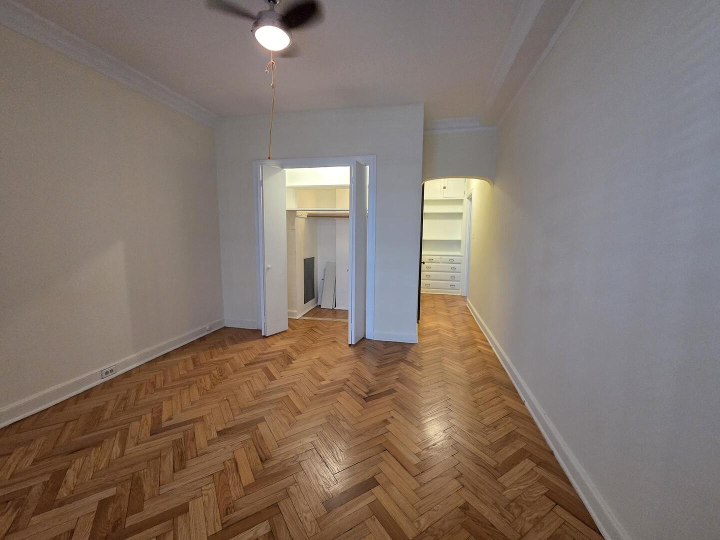 421 West Melrose Street, Unit 5D Chicago, IL 60657 - Photo 18 of 29 a view of an empty room with closet and a window