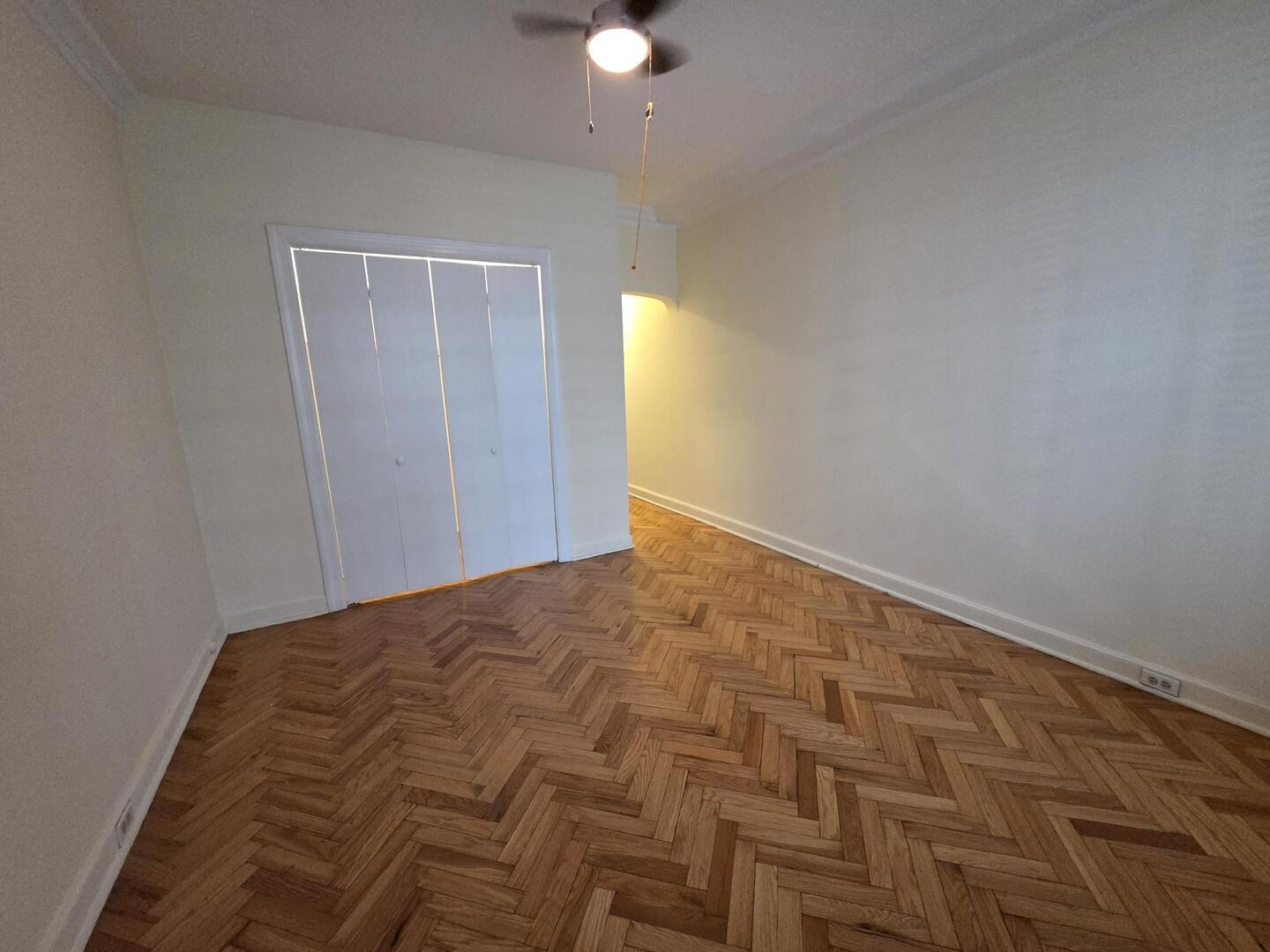 421 West Melrose Street, Unit 5D Chicago, IL 60657 - Photo 19 of 29 wooden floor in an empty room
