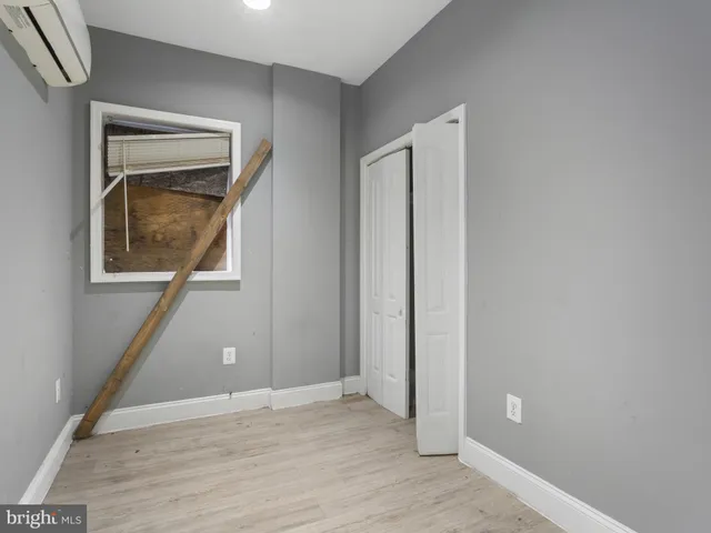 a bathroom view of a toilet and a sink