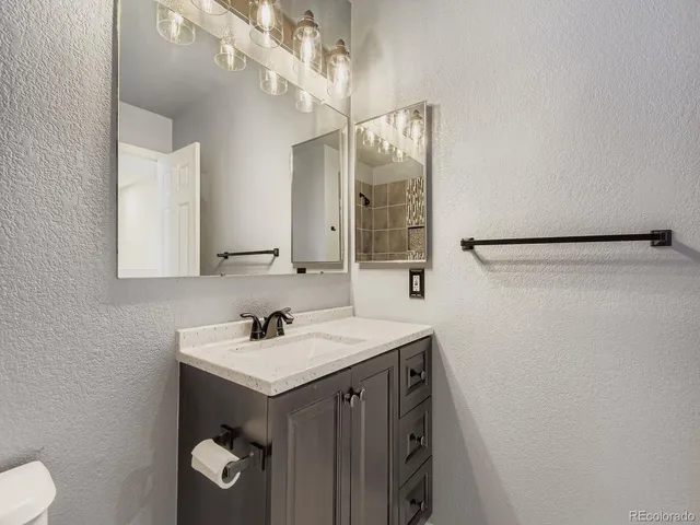 a view of room with window and wooden floor