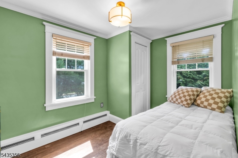 105 Somerville Road Bedminster, NJ 07921 - Photo 20 of 36 a bedroom with a bed and a window