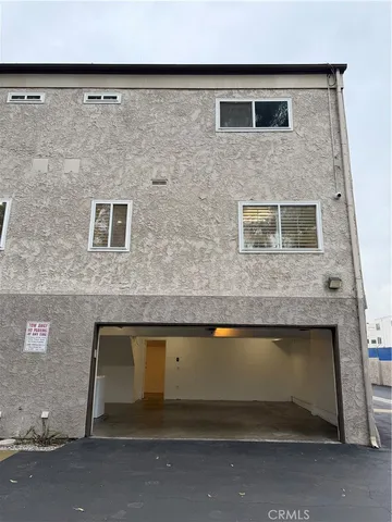 a view of a house with patio