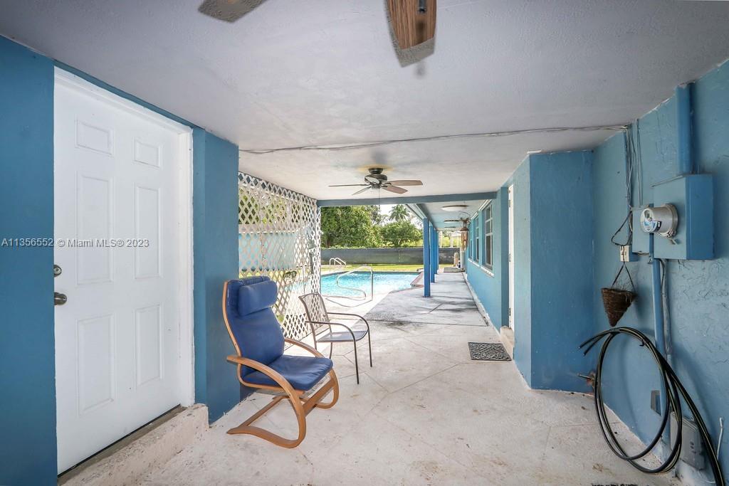 Redlands Homestead, FL 33031 - Photo 20 of 36 a view of a livingroom with furniture and a floor to ceiling window