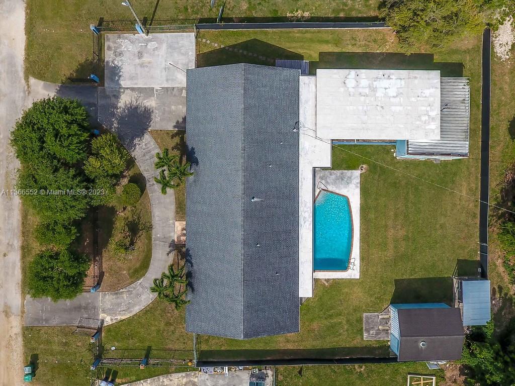 Redlands Homestead, FL 33031 - Photo 2 of 36 an aerial view of a house with a yard