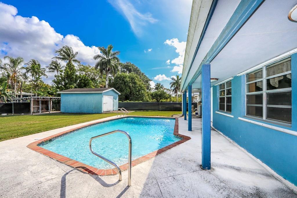 Redlands Homestead, FL 33031 - Photo 4 of 36 a view of a swimming pool with a lounge chairs