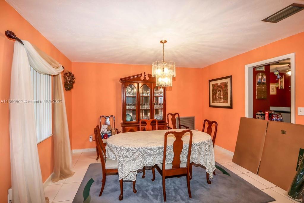 Redlands Homestead, FL 33031 - Photo 8 of 36 a dining room with furniture and window