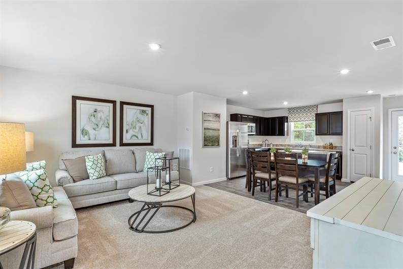 632 Merle Avenue Franklin, KY 42134 - Photo 4 of 11 a living room with furniture kitchen view and a dining table