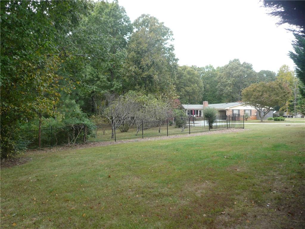 4815 Wade Green Road Northwest Acworth, GA 30102 - Photo 6 of 6 a view of outdoor space with deck and yard