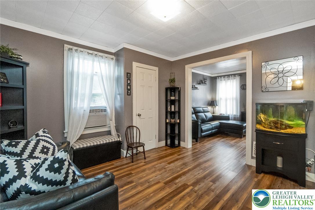 365 Rock Street Easton, PA 18042 - Photo 11 of 50 Rich wood-look flooring extends through this comfortable living area.