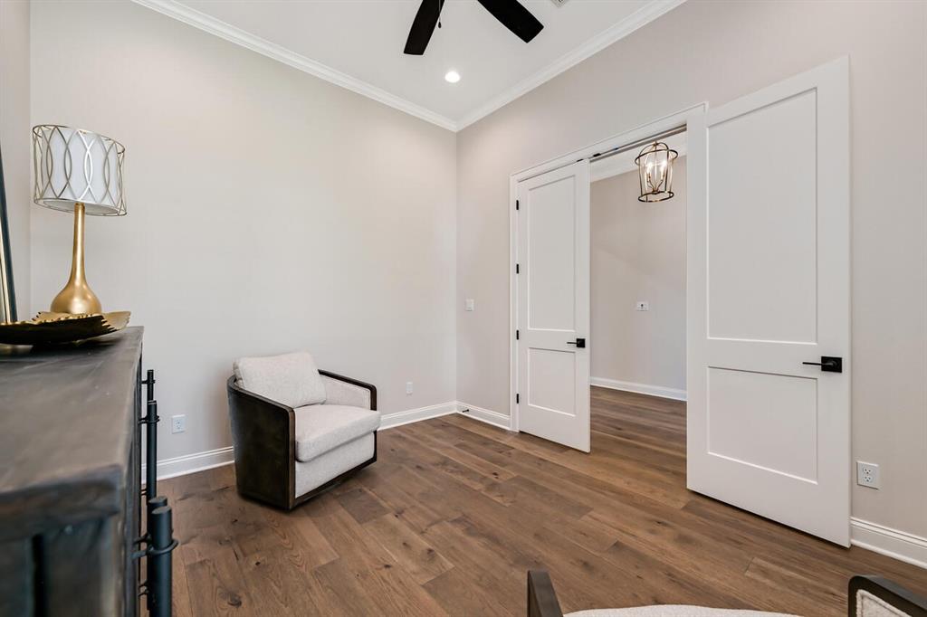 8005 Bee Cave Road China Spring, TX 76633 - Photo 10 of 40 a view of an empty room and wooden floor