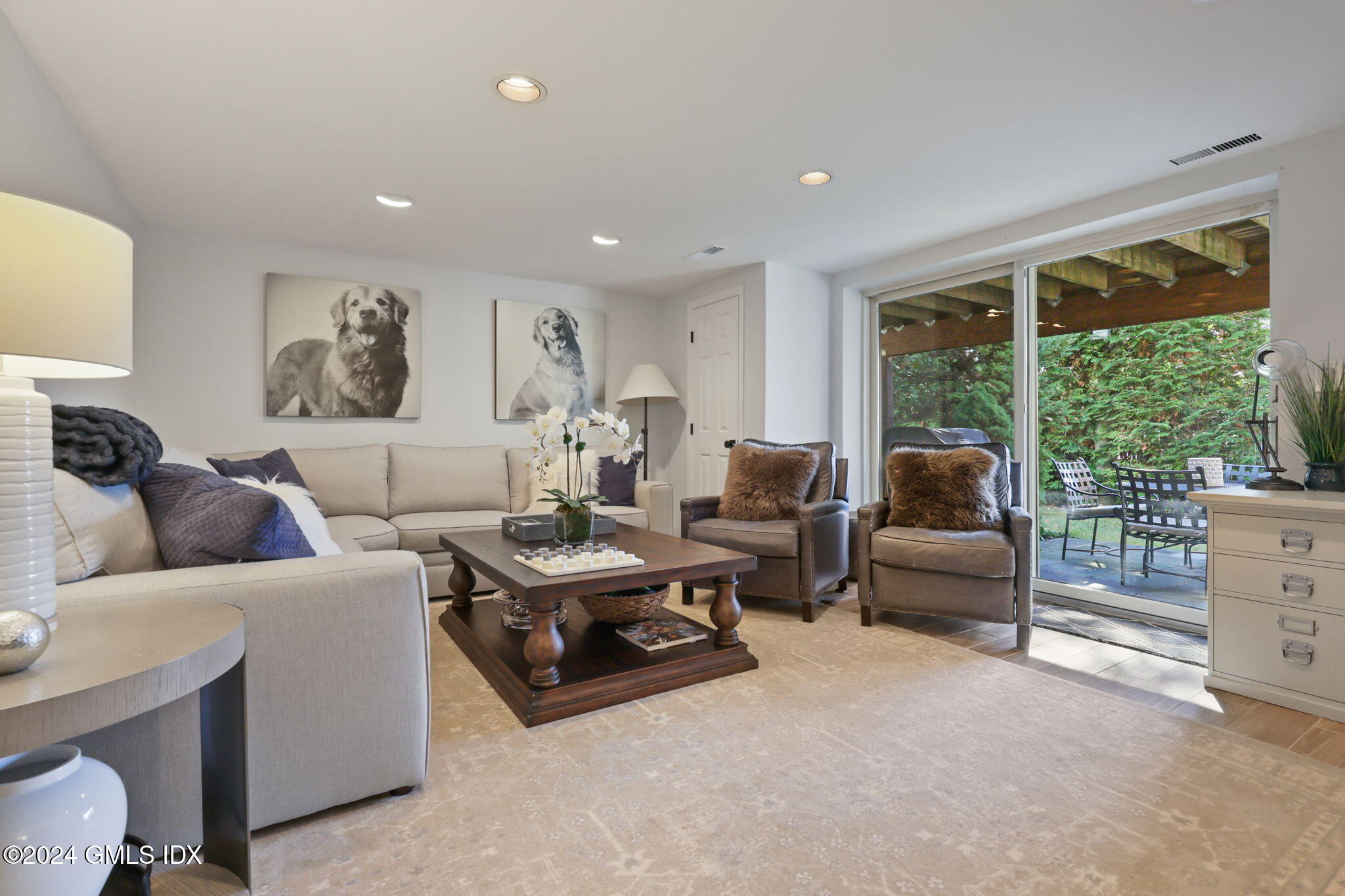 98 Valley Road, Unit 6 Cos Cob, CT 06807 - Photo 11 of 16 a living room with furniture and a large window