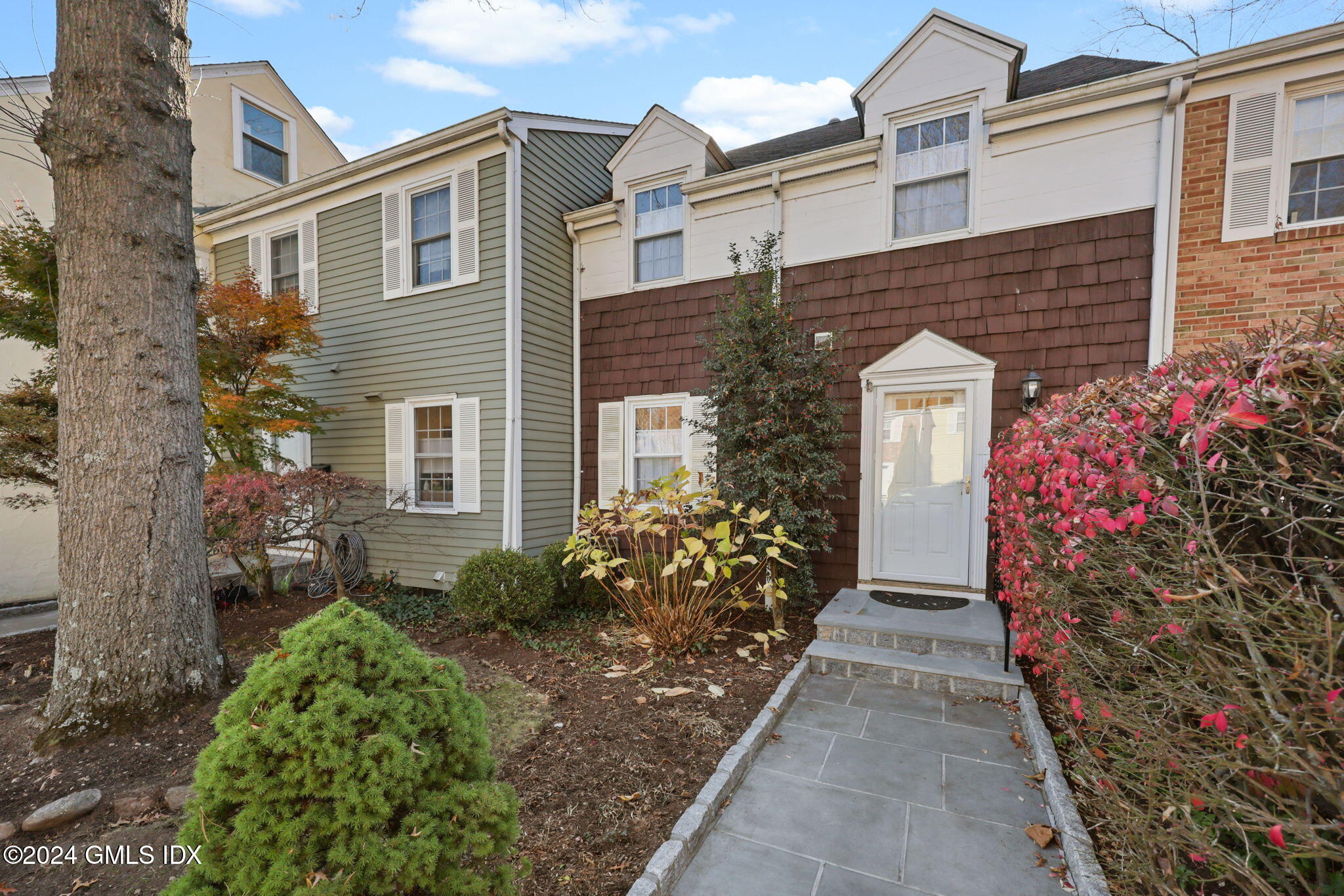98 Valley Road, Unit 6 Cos Cob, CT 06807 - Photo 13 of 16 a front view of a house