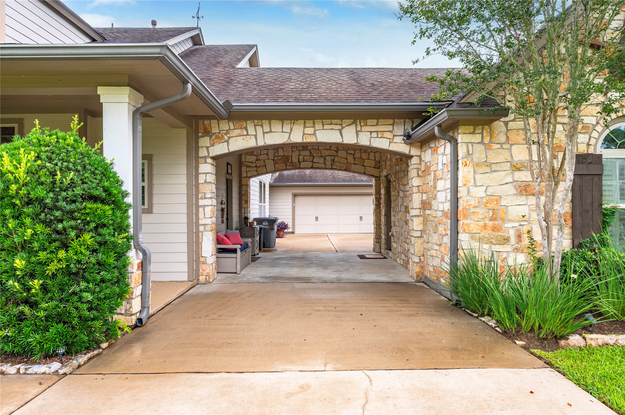 17126 Hamill Drive Rosharon, TX 77583 - Photo 49 of 50 Carport that leads back to the two car attached garage. Additional room on side of carpot.