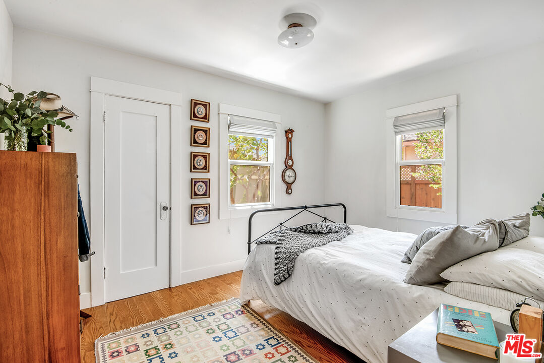 3828 Seneca Avenue Los Angeles, CA 90039 - Photo 20 of 40 a bedroom with a bed and a window