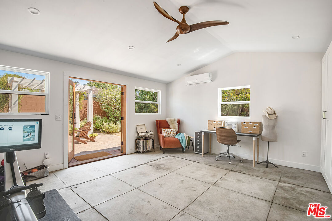 3828 Seneca Avenue Los Angeles, CA 90039 - Photo 30 of 40 a living room with furniture and a window