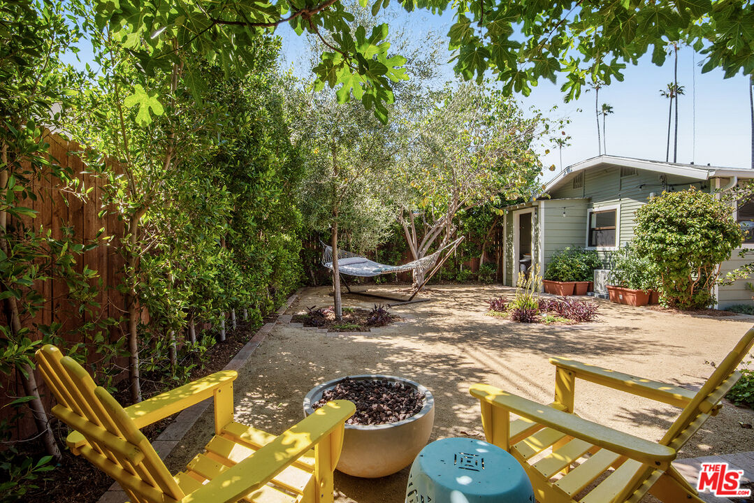 3828 Seneca Avenue Los Angeles, CA 90039 - Photo 38 of 40 a view of a chair and tables in the patio
