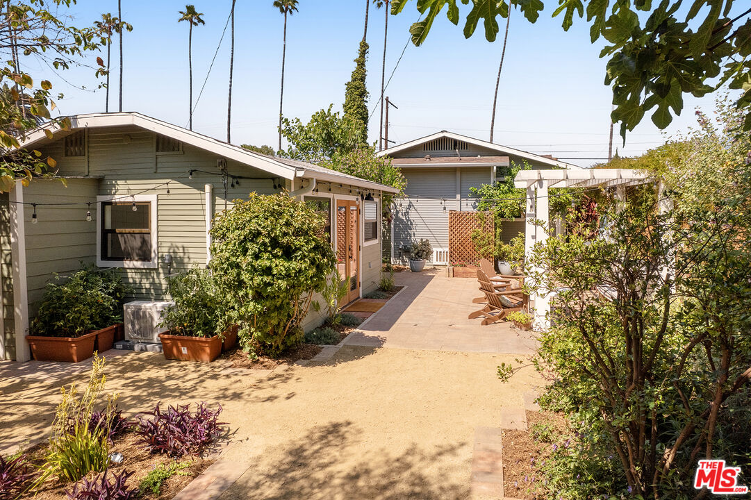 3828 Seneca Avenue Los Angeles, CA 90039 - Photo 40 of 40 a view of a house with a yard and sitting area