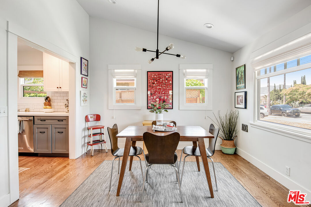 3828 Seneca Avenue Los Angeles, CA 90039 - Photo 5 of 40 a view of a dining room with furniture window and wooden floor