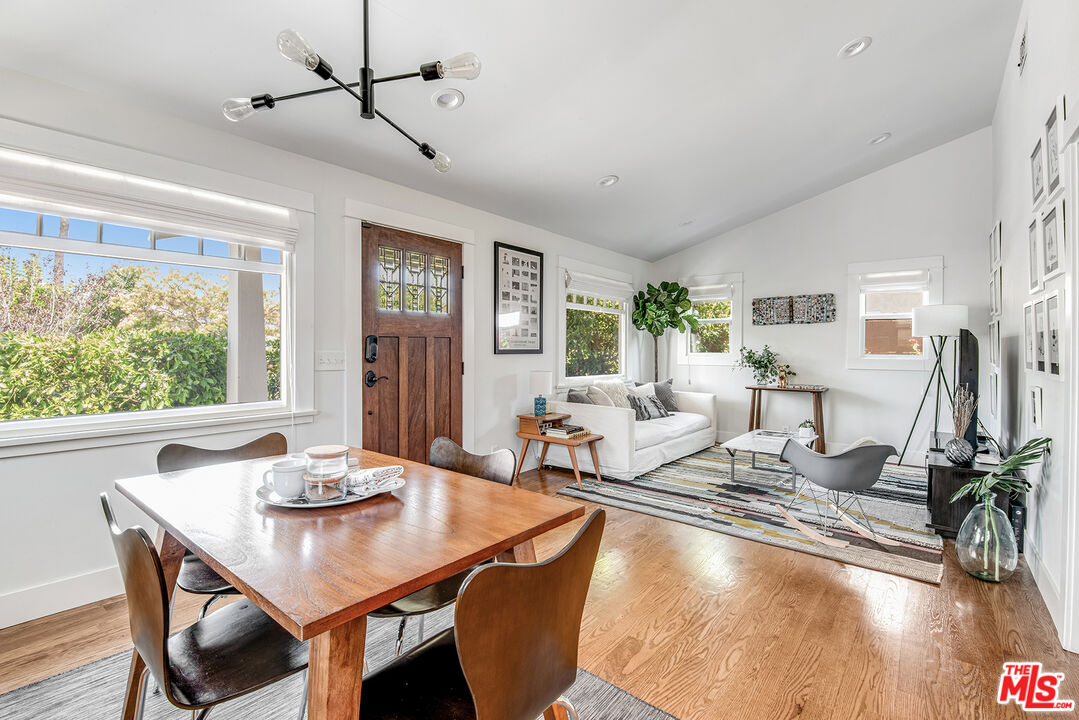 3828 Seneca Avenue Los Angeles, CA 90039 - Photo 7 of 40 a view of a dining room with furniture window and wooden floor