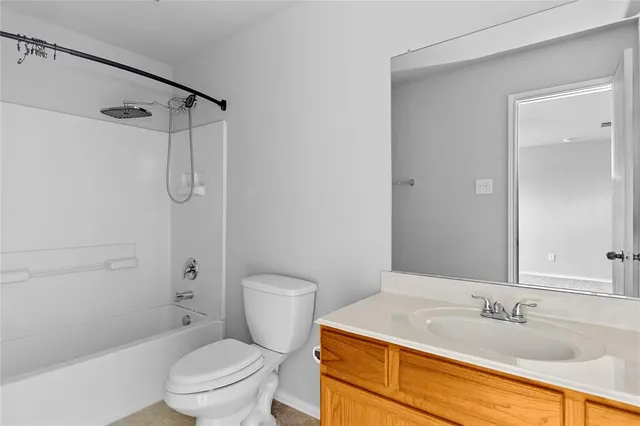 a view of a hallway with a window