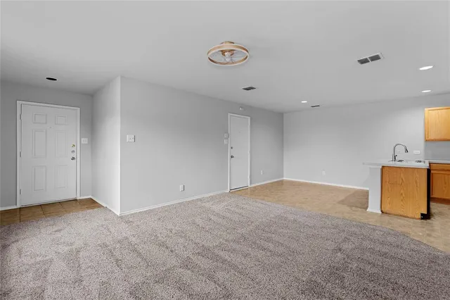 a view of a kitchen with a sink