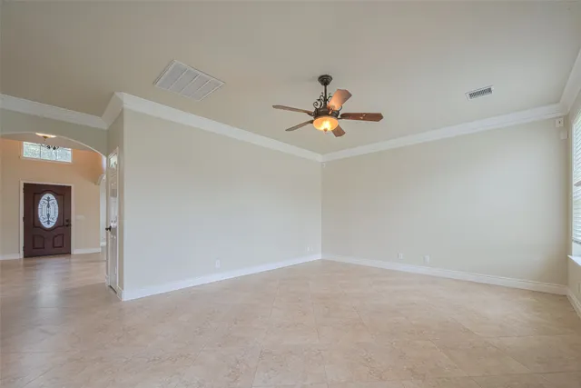 a kitchen with stainless steel appliances granite countertop a sink a stove and a microwave