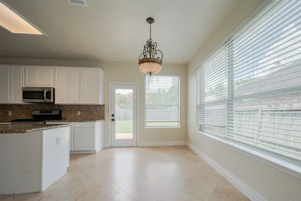 a view of a livingroom and a window