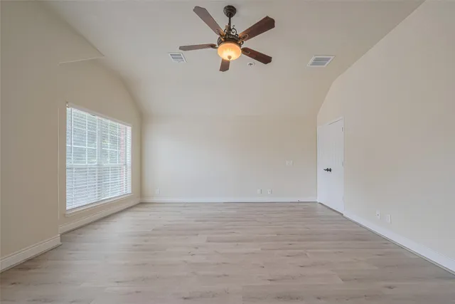a bathroom with sink granite and mirror