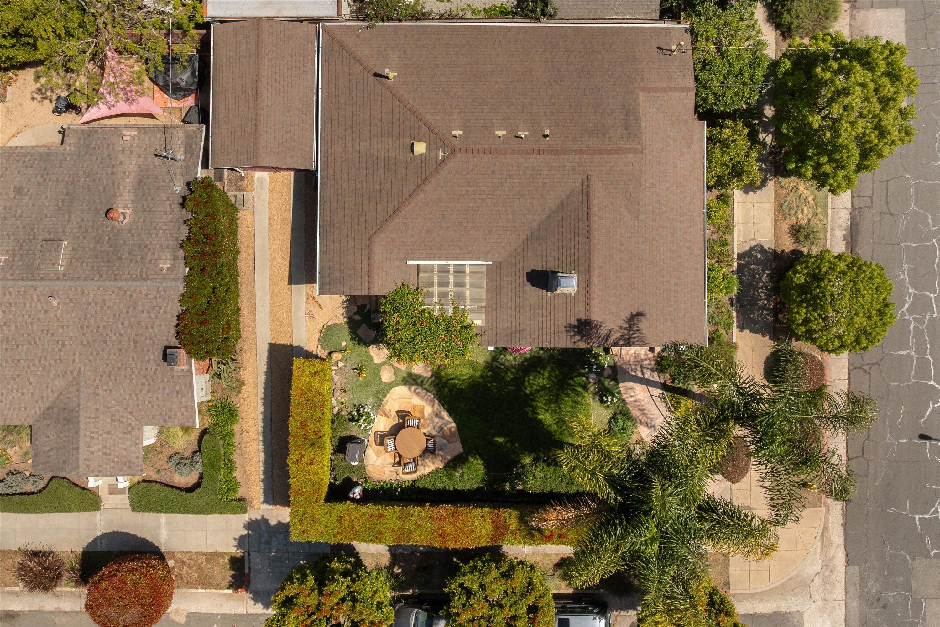 601 East Victoria Street Santa Barbara, CA 93103 - Photo 28 of 32 an aerial view of a house with a yard and potted plants
