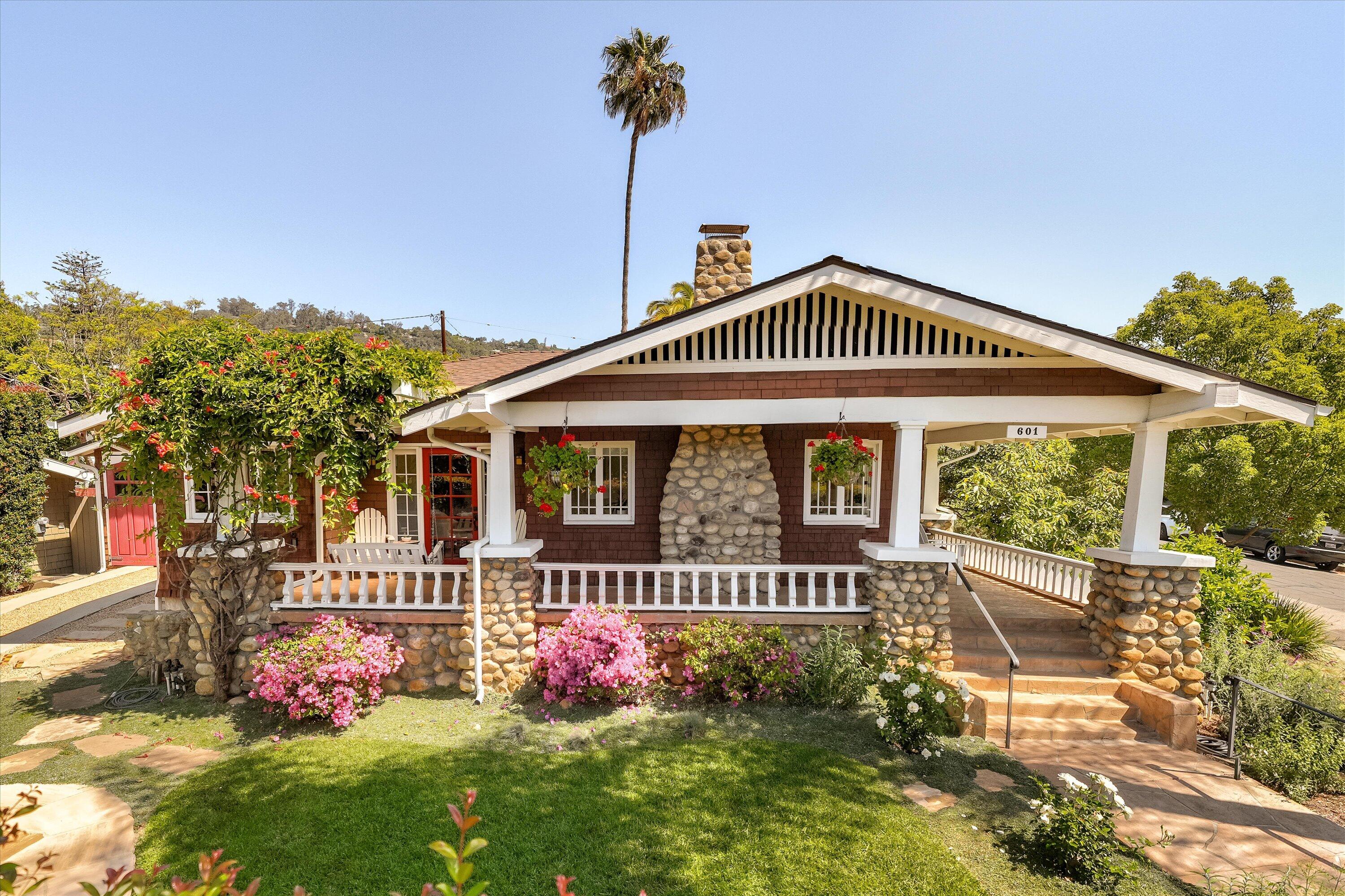 601 East Victoria Street Santa Barbara, CA 93103 - Photo 4 of 32 a front view of a house with garden