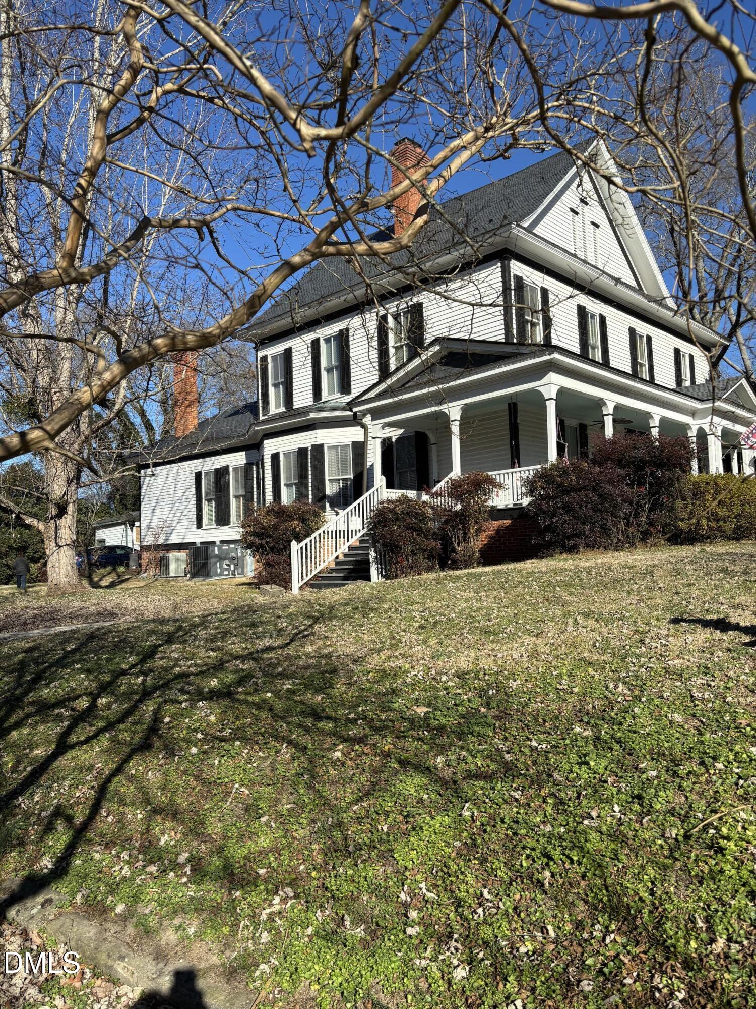 a front view of residential houses with yard