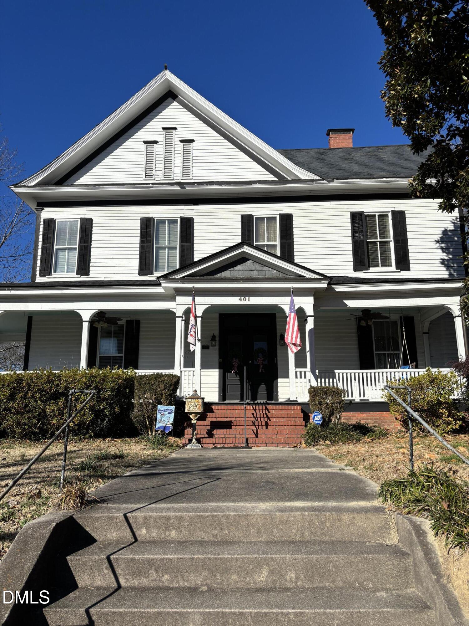 a front view of a house with a porch