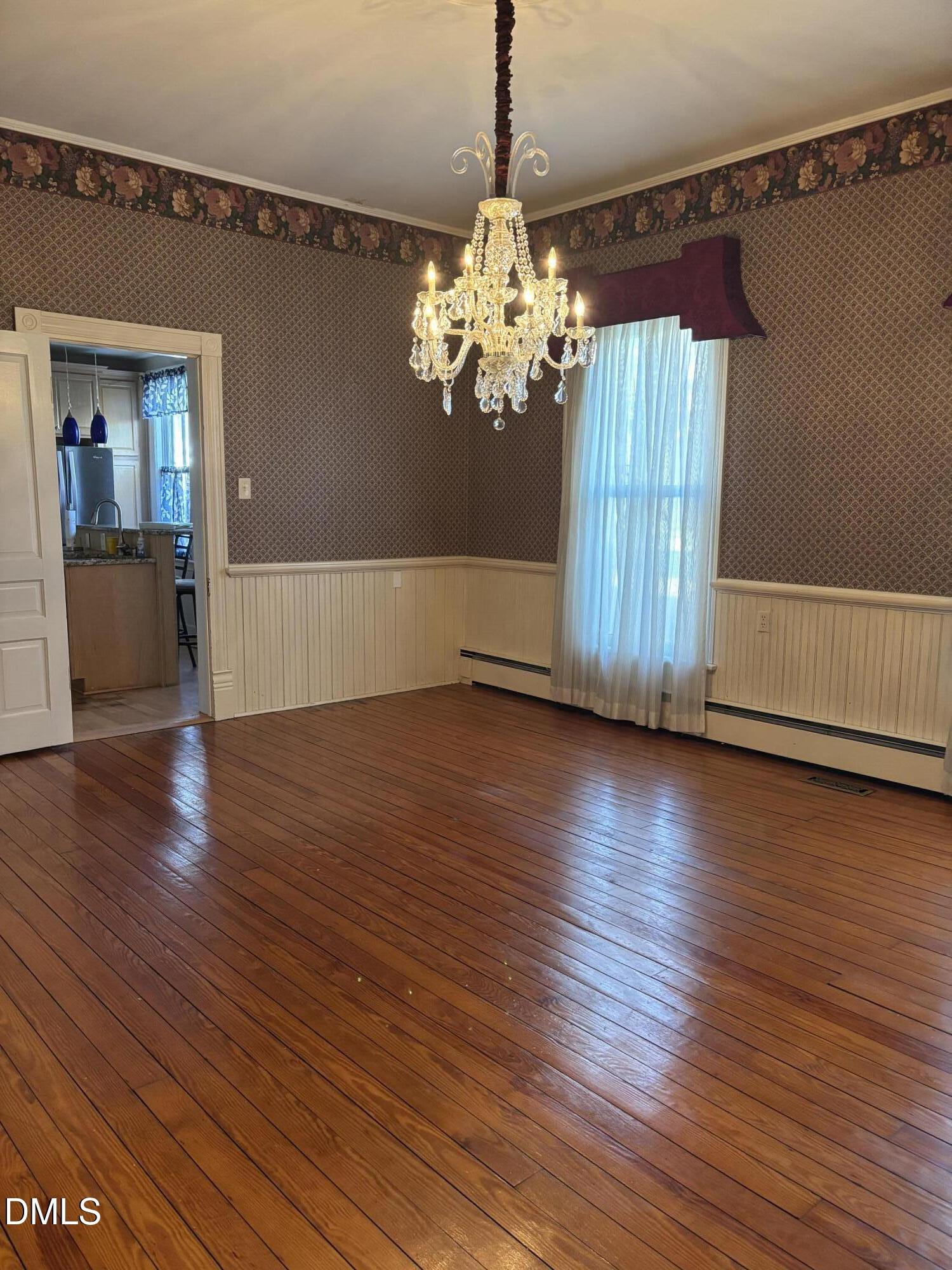 401 North Main Street Louisburg, NC 27549 - Photo 35 of 47 a view of a livingroom with wooden floor