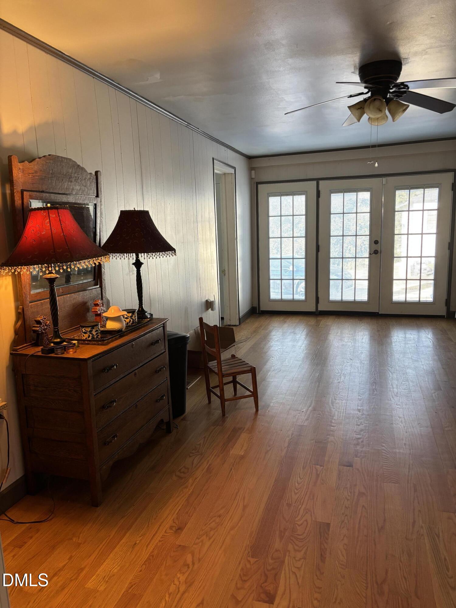401 North Main Street Louisburg, NC 27549 - Photo 36 of 47 a living room with furniture and a flat screen tv