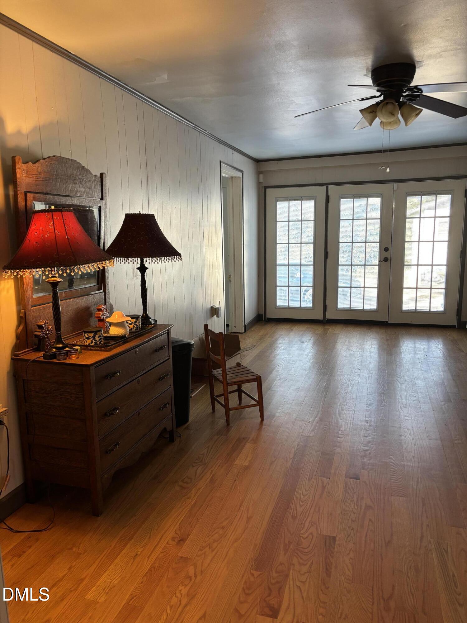 401 North Main Street Louisburg, NC 27549 - Photo 39 of 47 a living room with furniture and a flat screen tv