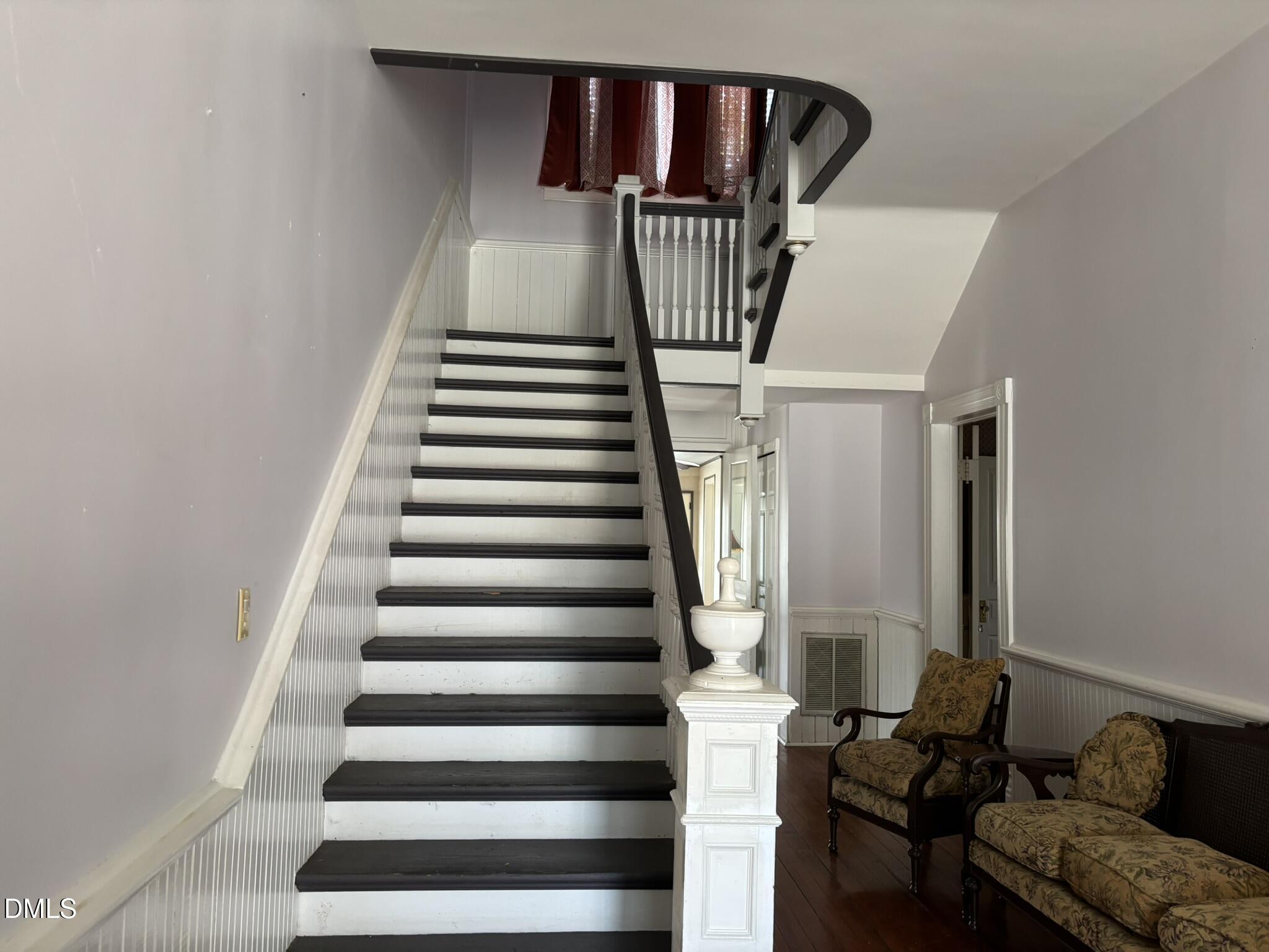 401 North Main Street Louisburg, NC 27549 - Photo 6 of 47 a view of entryway and hall with wooden floor