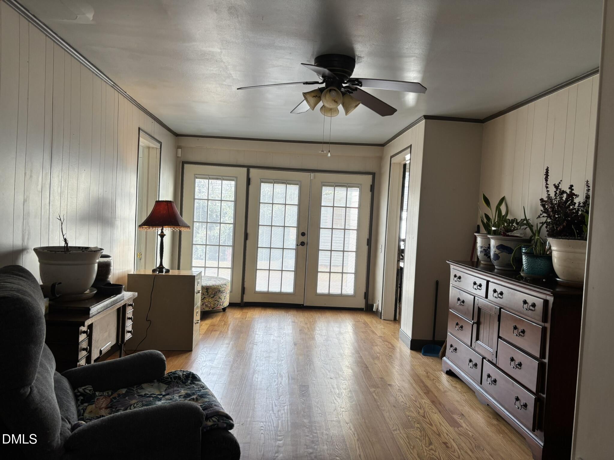401 North Main Street Louisburg, NC 27549 - Photo 7 of 47 a living room with furniture and wooden floor