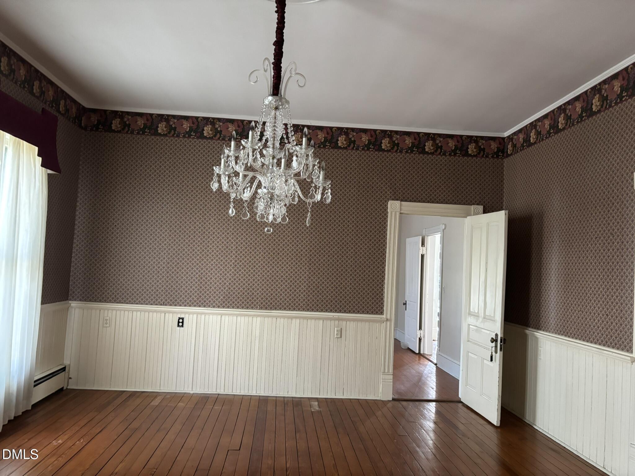401 North Main Street Louisburg, NC 27549 - Photo 8 of 47 a view of a livingroom with wooden floor