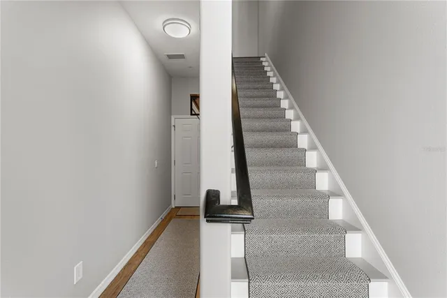 a view of entryway with wooden floor