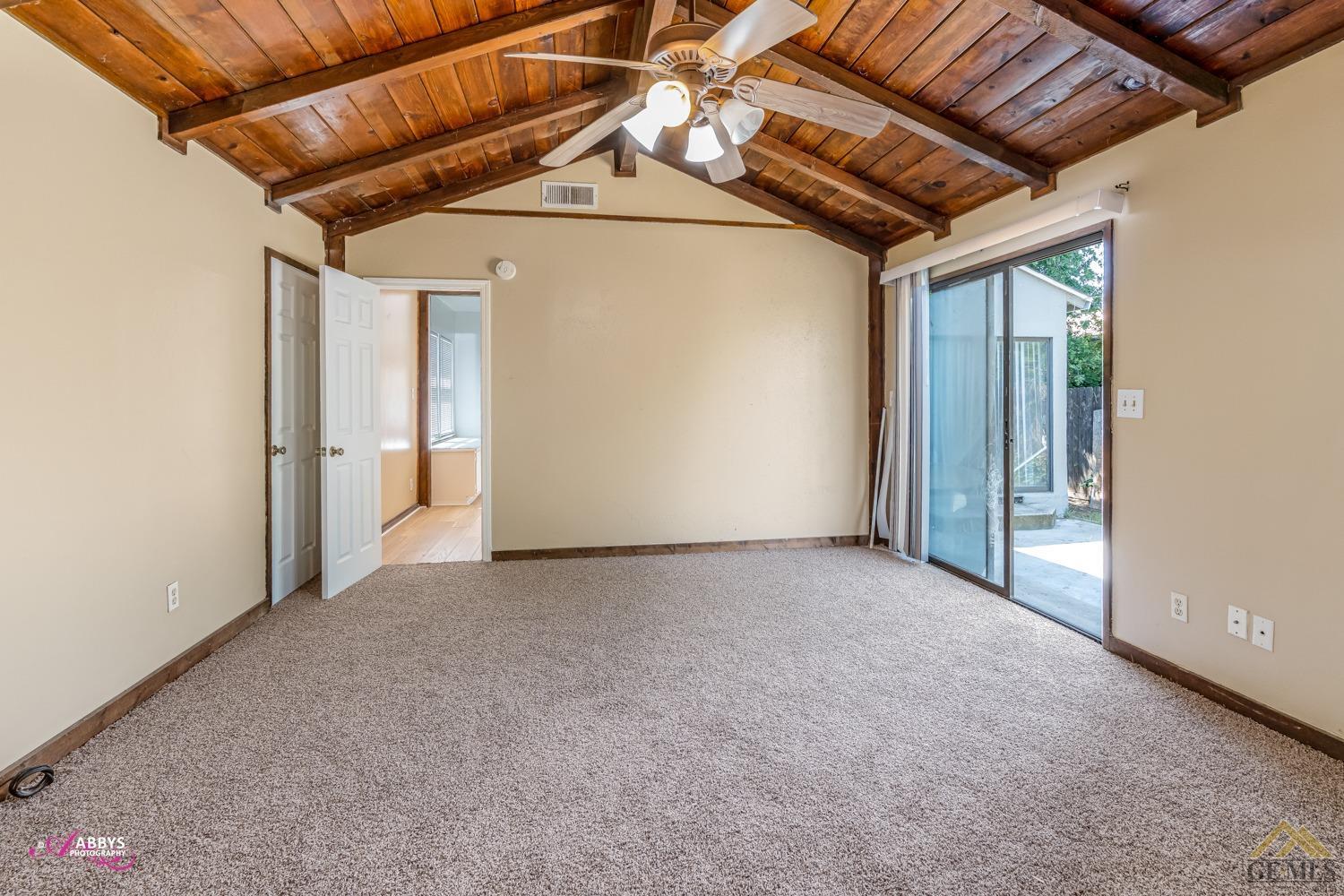 Undisclosed Address Bakersfield, CA 93308 - Photo 20 of 37 Primary bedroom with private entrance to backyard.