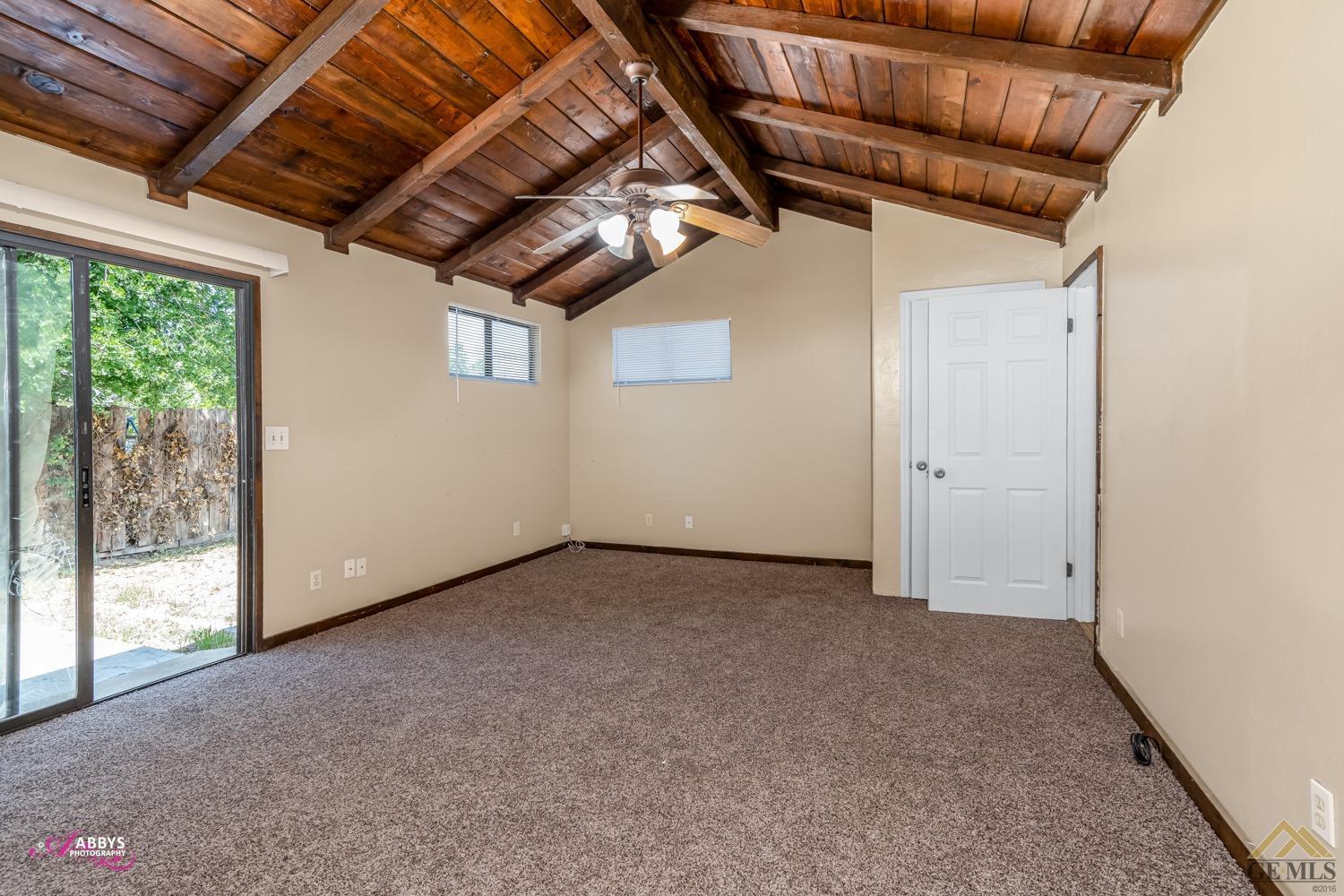 Undisclosed Address Bakersfield, CA 93308 - Photo 21 of 37 a view of a room with wooden walls