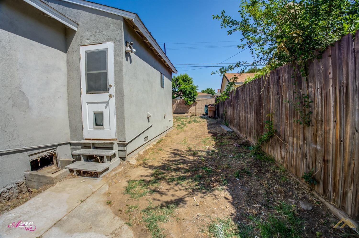 Undisclosed Address Bakersfield, CA 93308 - Photo 27 of 37 a view of a backyard of the house
