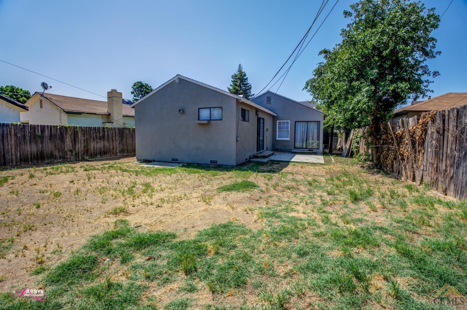 Undisclosed Address Bakersfield, CA 93308 - Photo 33 of 37 a view of a house with a yard