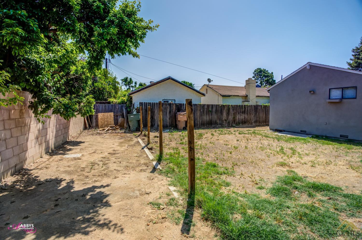 Undisclosed Address Bakersfield, CA 93308 - Photo 34 of 37 a view of a house with a yard