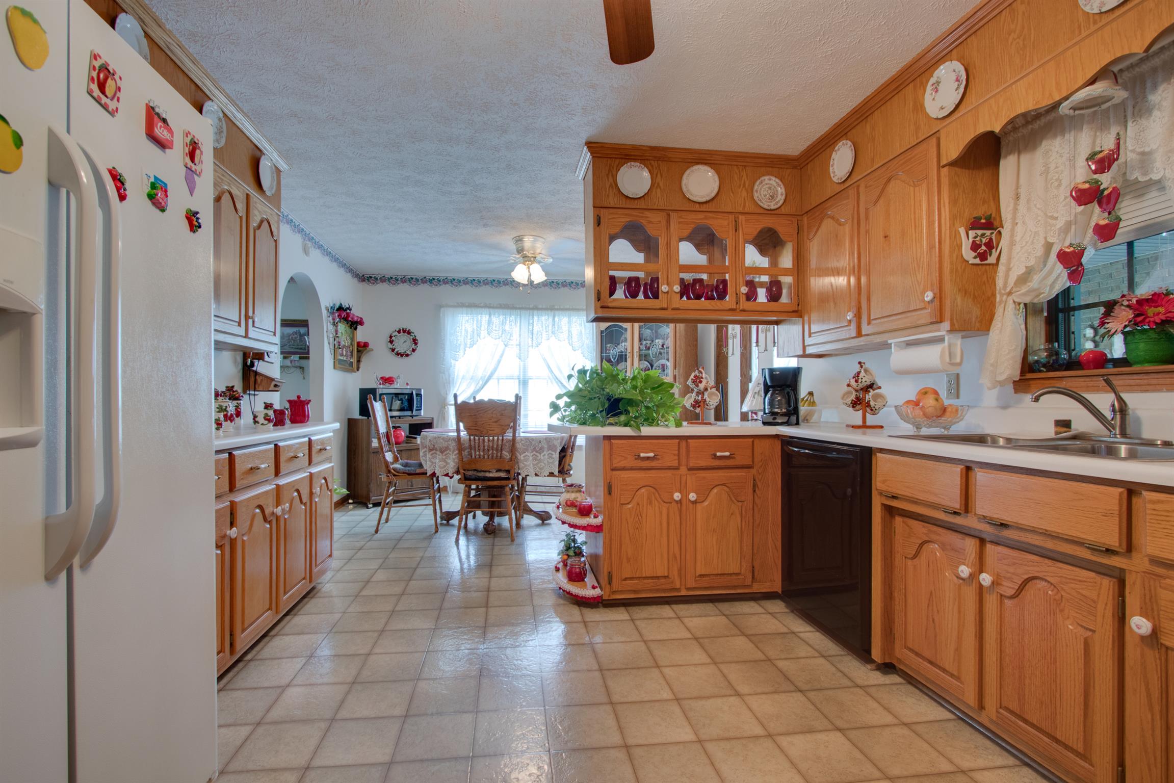 175 Lock 7 Lane Carthage, TN 37030 - Photo 8 of 30 a kitchen with stainless steel appliances a refrigerator and a sink