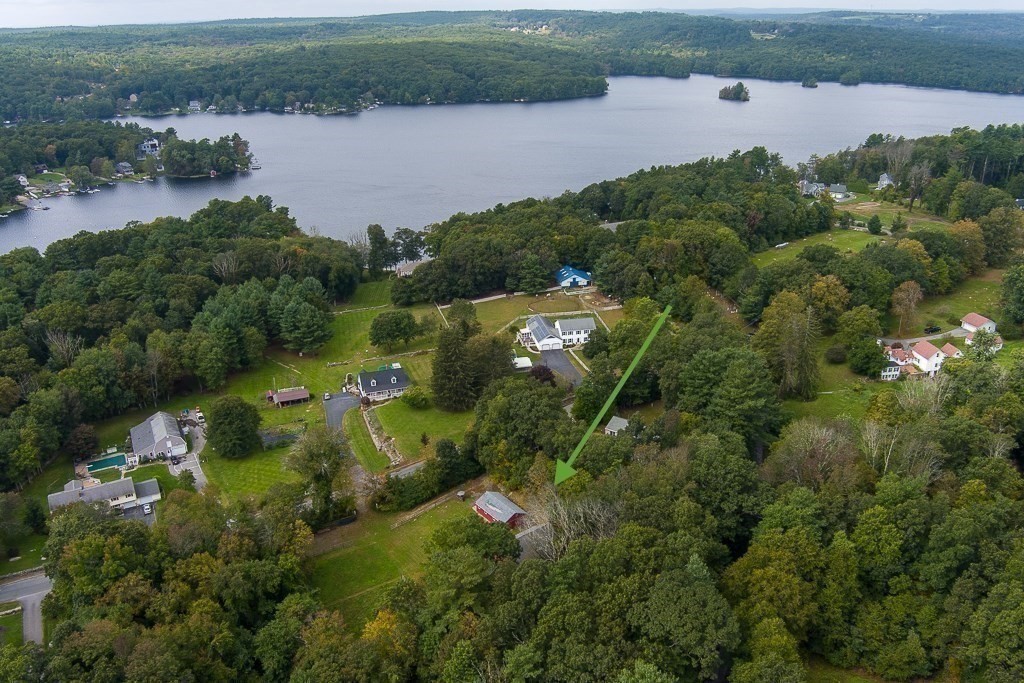 5 Torrey Road Sutton, MA 01590 - Photo 3 of 42 an aerial view of green landscape with trees houses and lake view